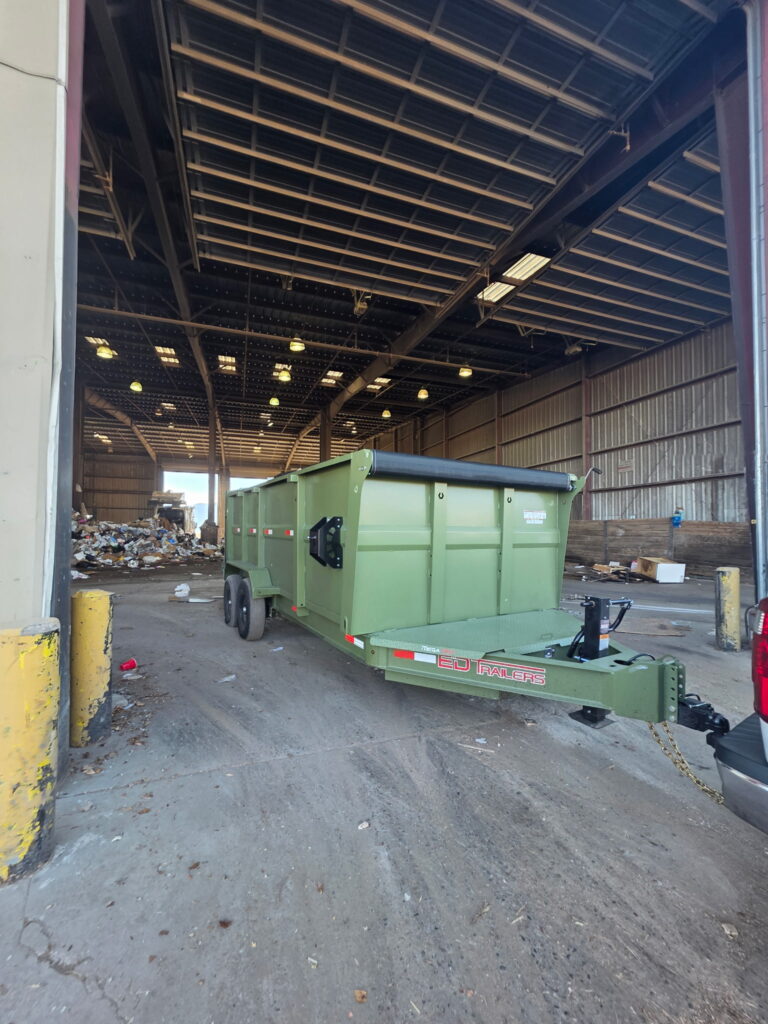 high country junk removal and hauling trailer at dump in colorado springs 1.jpeg