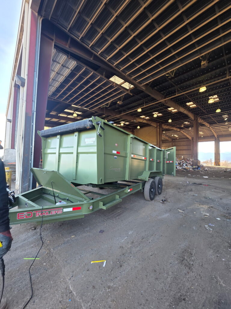 high country junk removal and hauling trailer pulling into dump in colorado springs 1.jpeg
