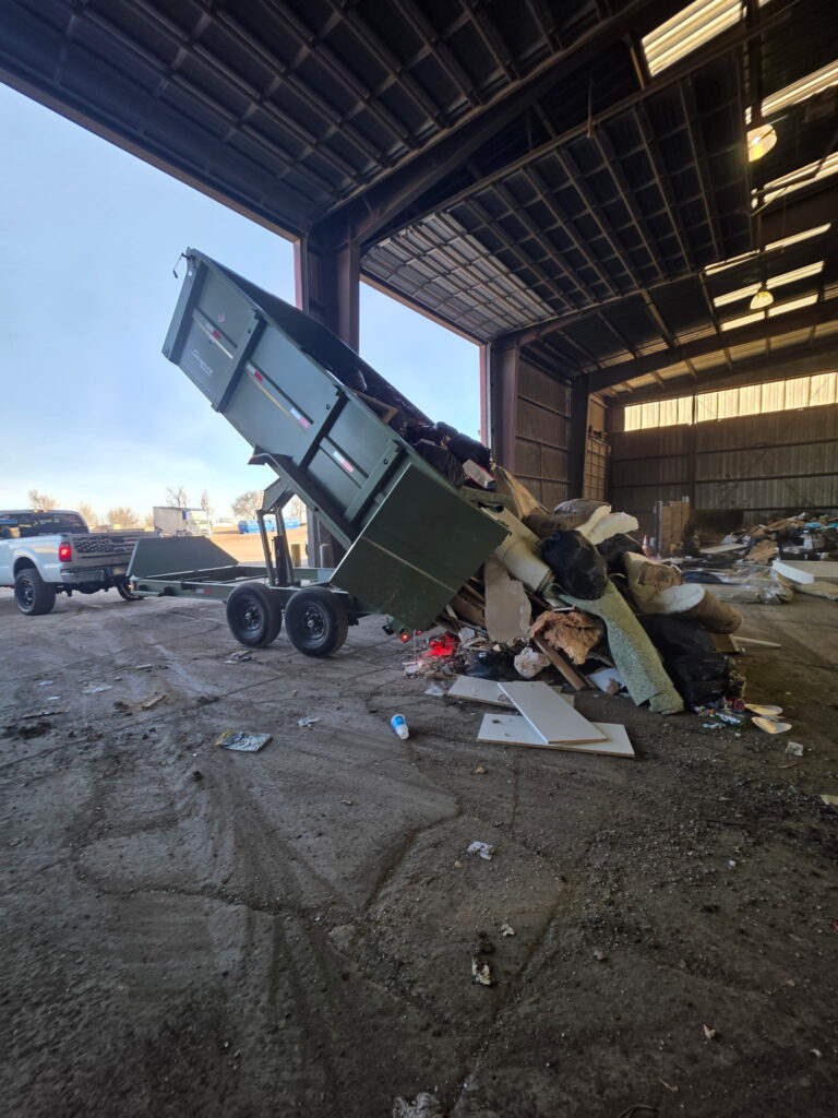 high country junk removal and hauling unloading junk at dump in colorado springs 1.jpeg